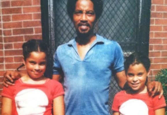 Kari Hillsman (right) with her sister Tarah and Father AC Hilsman. 